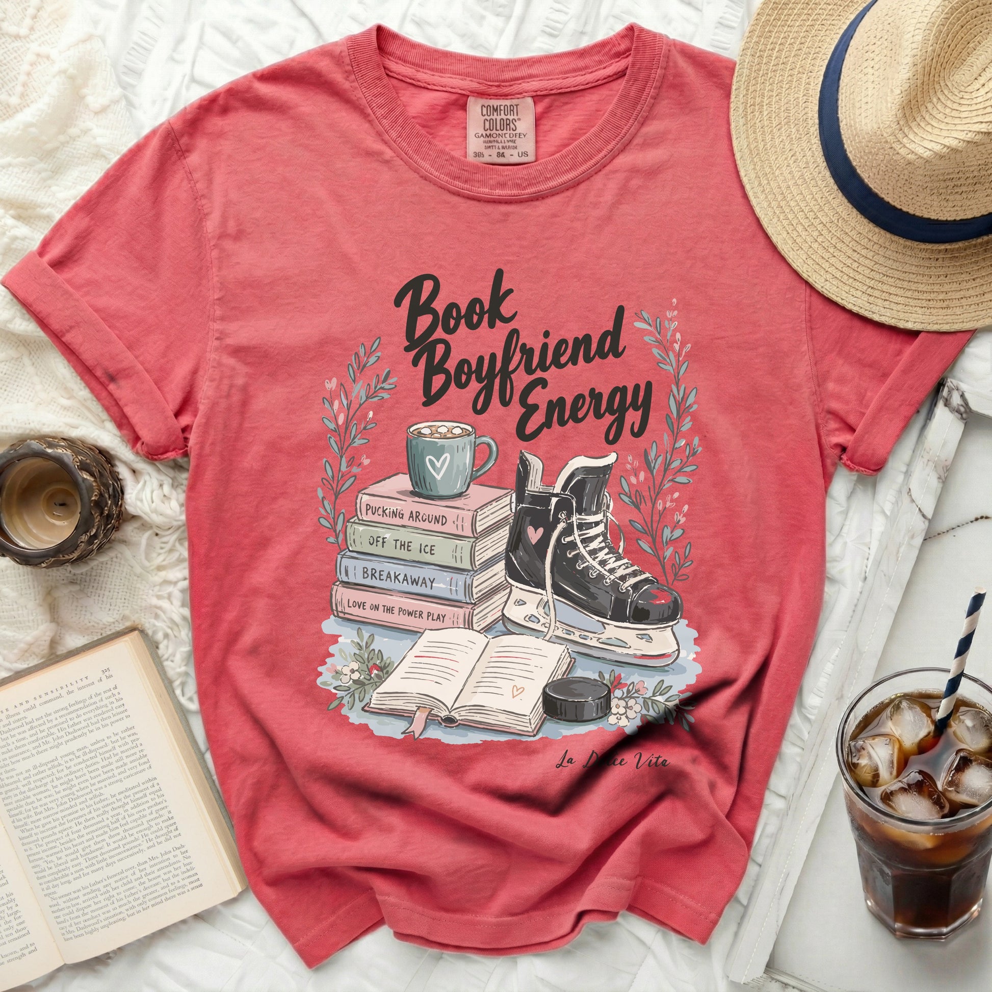 T-shirt with "Book Boyfriend Energy" graphic of ice skates and books.