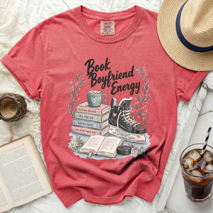 T-shirt with "Book Boyfriend Energy" graphic of ice skates and books.