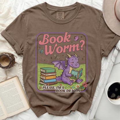 Cute dragon reading books t-shirt with "Book Worm? Please, I'm a Book Dragon" text.