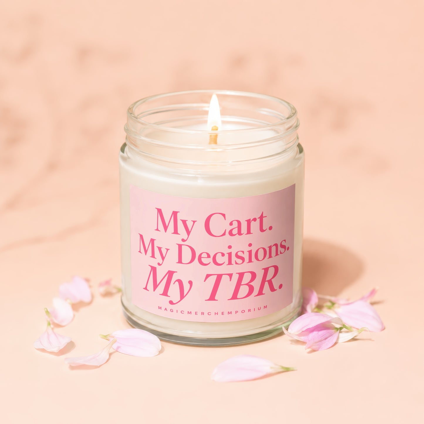 Glass jar candle with pink label reading "My Cart. My Decisions. My TBR."