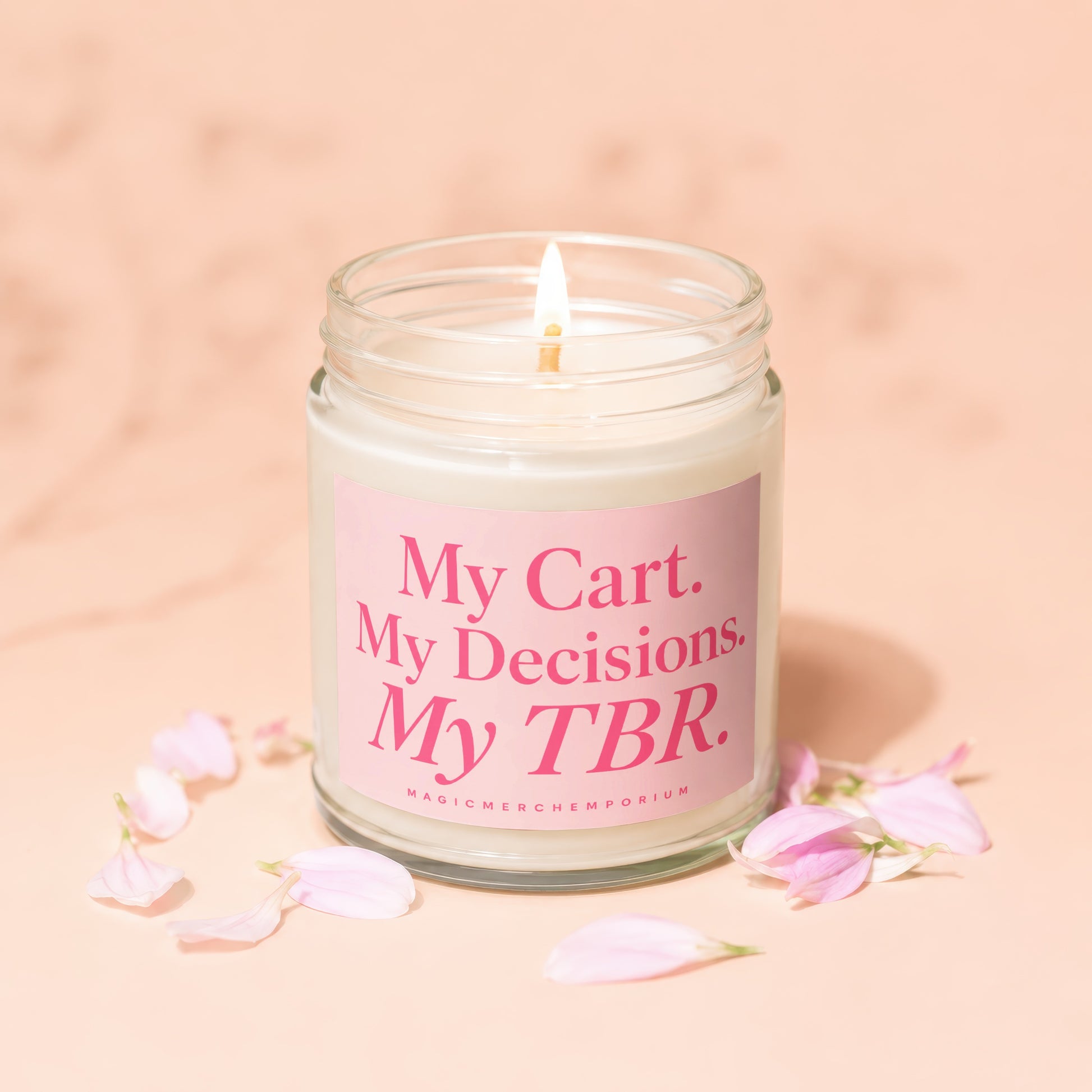 Glass jar candle with pink label reading "My Cart. My Decisions. My TBR."