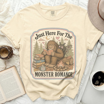 Bigfoot and moth reading books by campfire with text "Just Here For The Monster Romance".