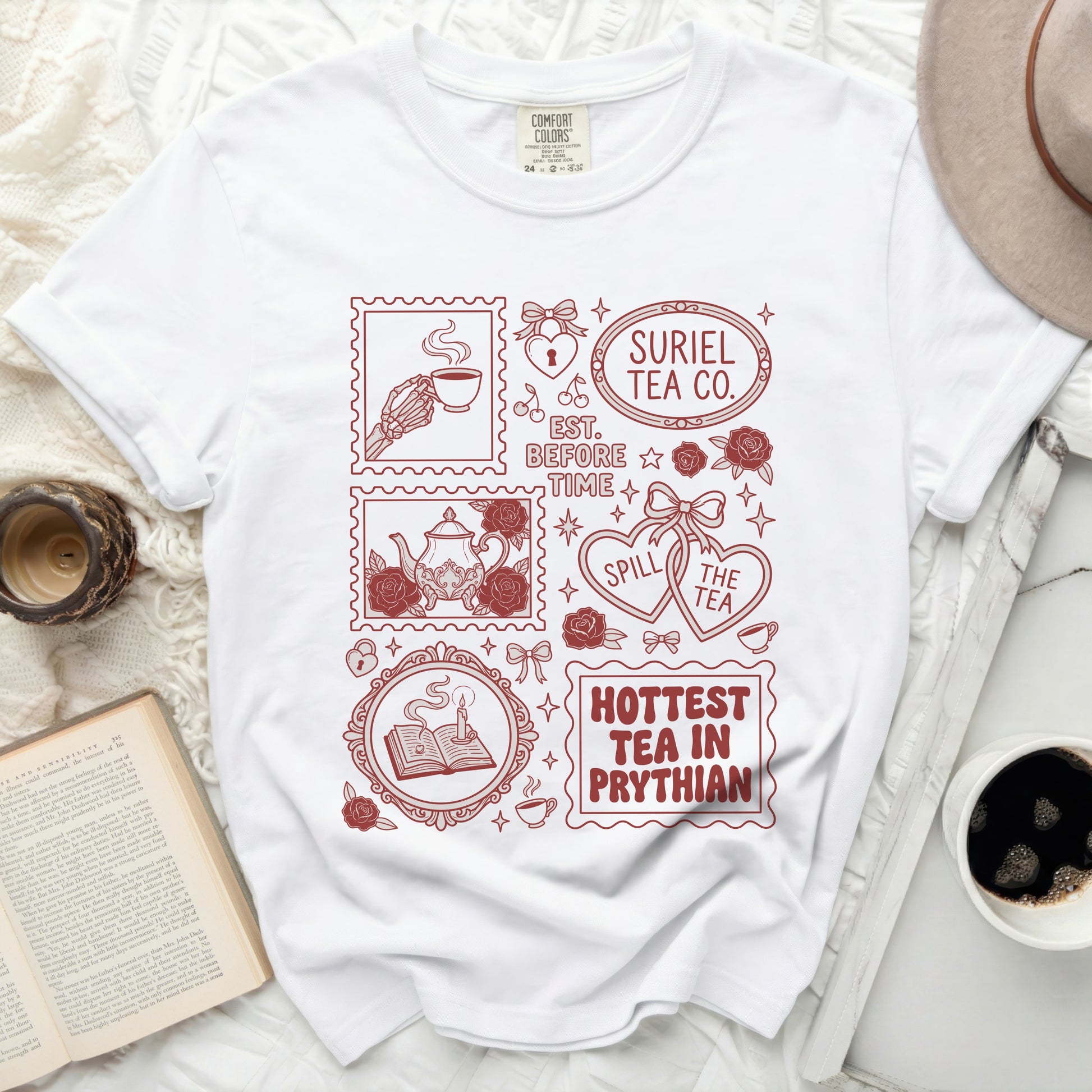 White Comfort Colors t-shirt with Suriel Tea Co. and other graphic elements.