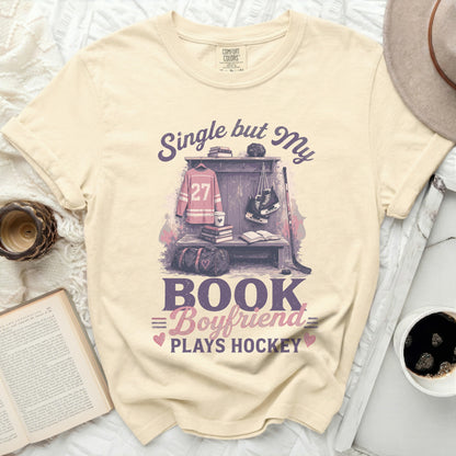 T-shirt with "Single but My Boyfriend Plays Hockey" graphic.
