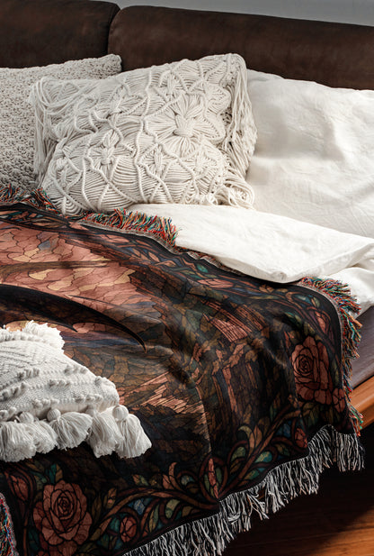 a cozy and inviting bedroom scene, featuring a bed with a colorful, patterned blanket and a white pillow. The bed is set against a brown leather headboard, creating a warm and comfortable atmosphere.
