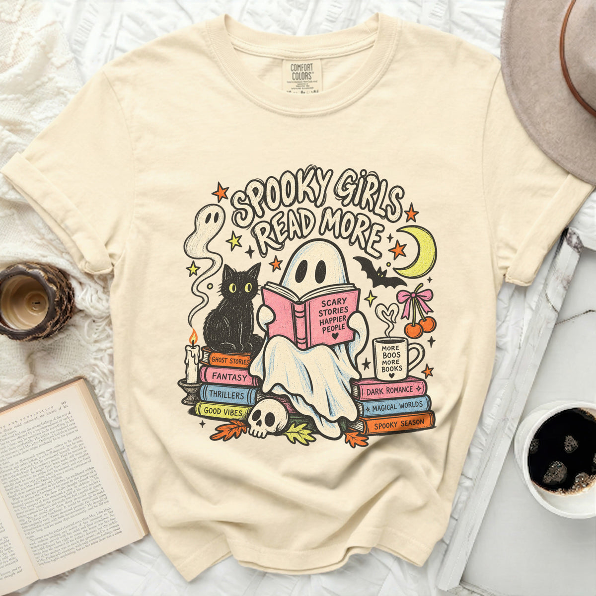 Ghost reading a book with "Spooky Girls Read More" and Halloween illustrations.