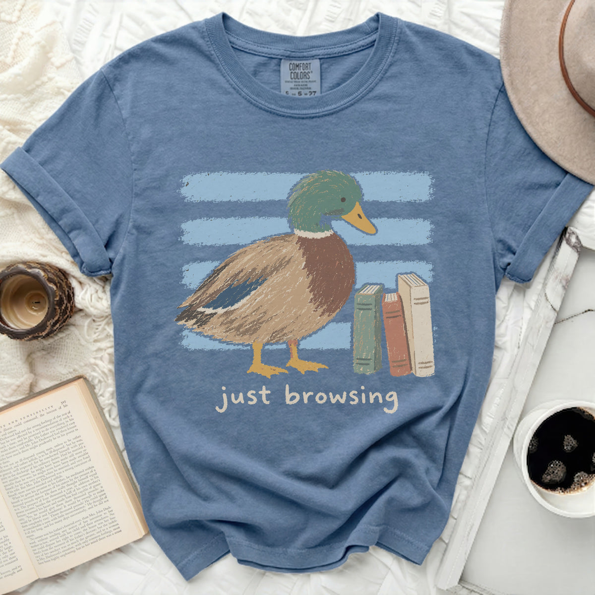 Blue t-shirt with a mallard duck and books graphic and "just browsing" text.