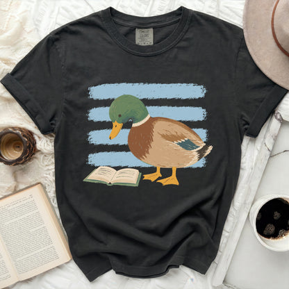 T-shirt with mallard duck illustration reading a book.