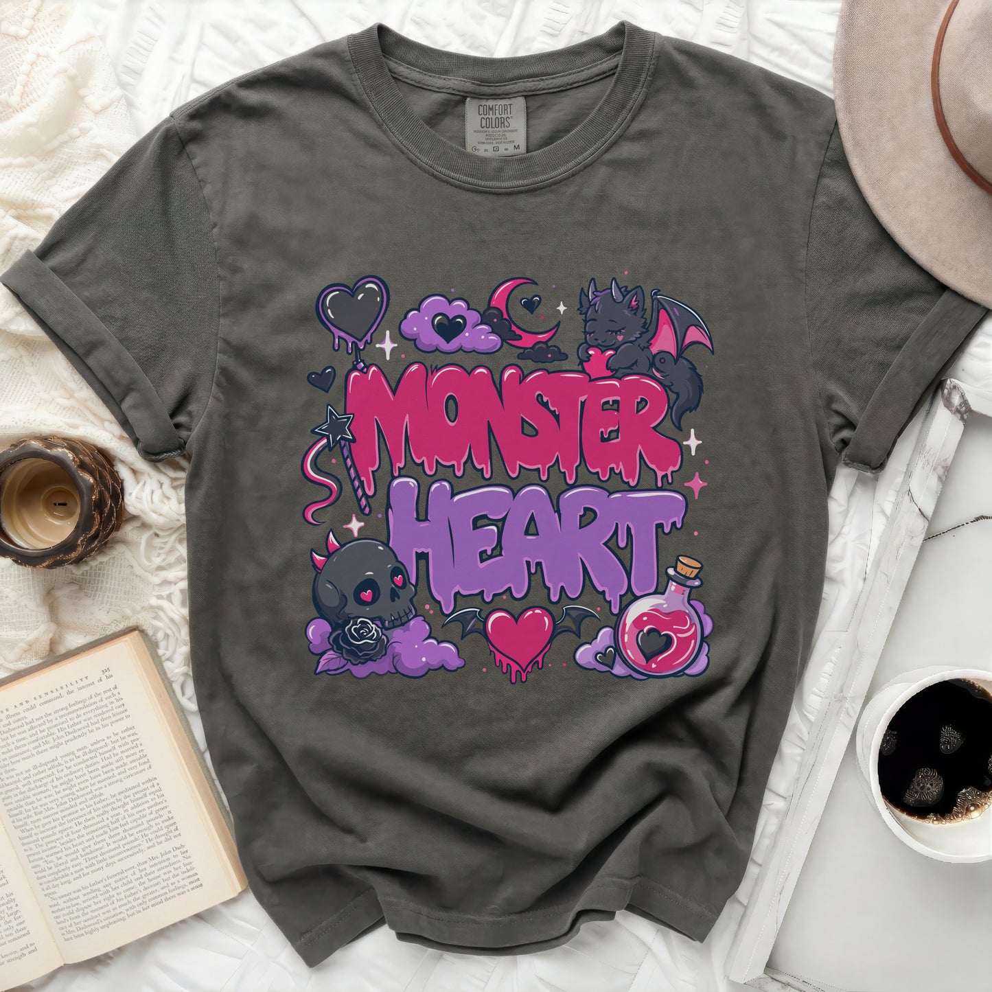 Dark gray t-shirt with "Monster Heart" in colorful graffiti style lettering.