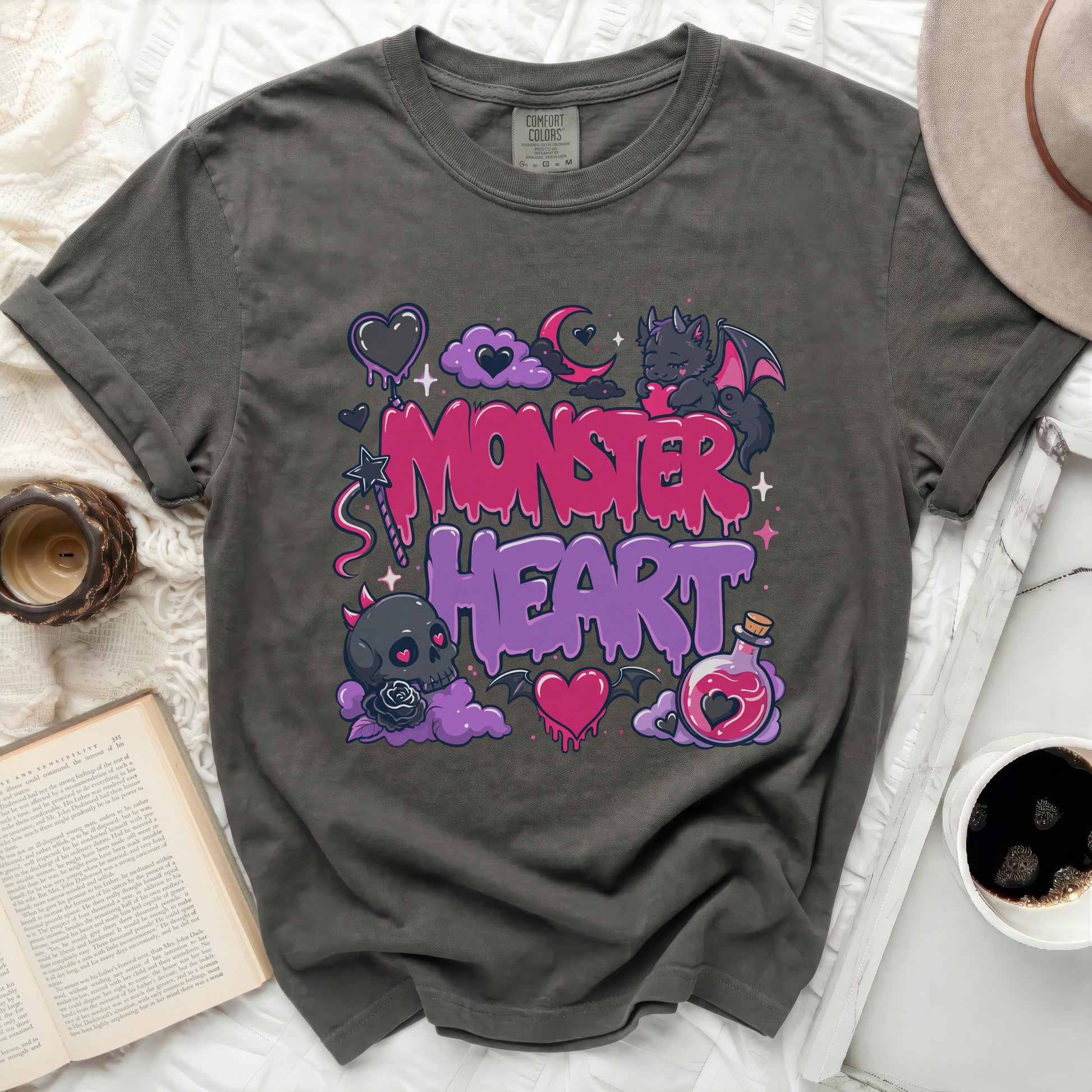 Dark gray t-shirt with "Monster Heart" in colorful graffiti style lettering.
