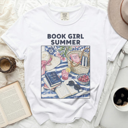 White t-shirt with "Book Girl Summer" graphic of beach items and books.