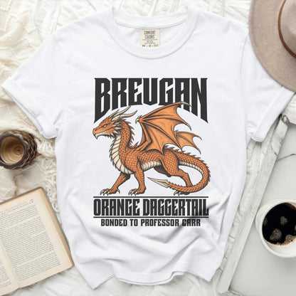 White t-shirt with orange dragon graphic and text "BREUGAN", "ORANGE DAGGERTAIL", "BONDED TO PROFESSOR CARR".