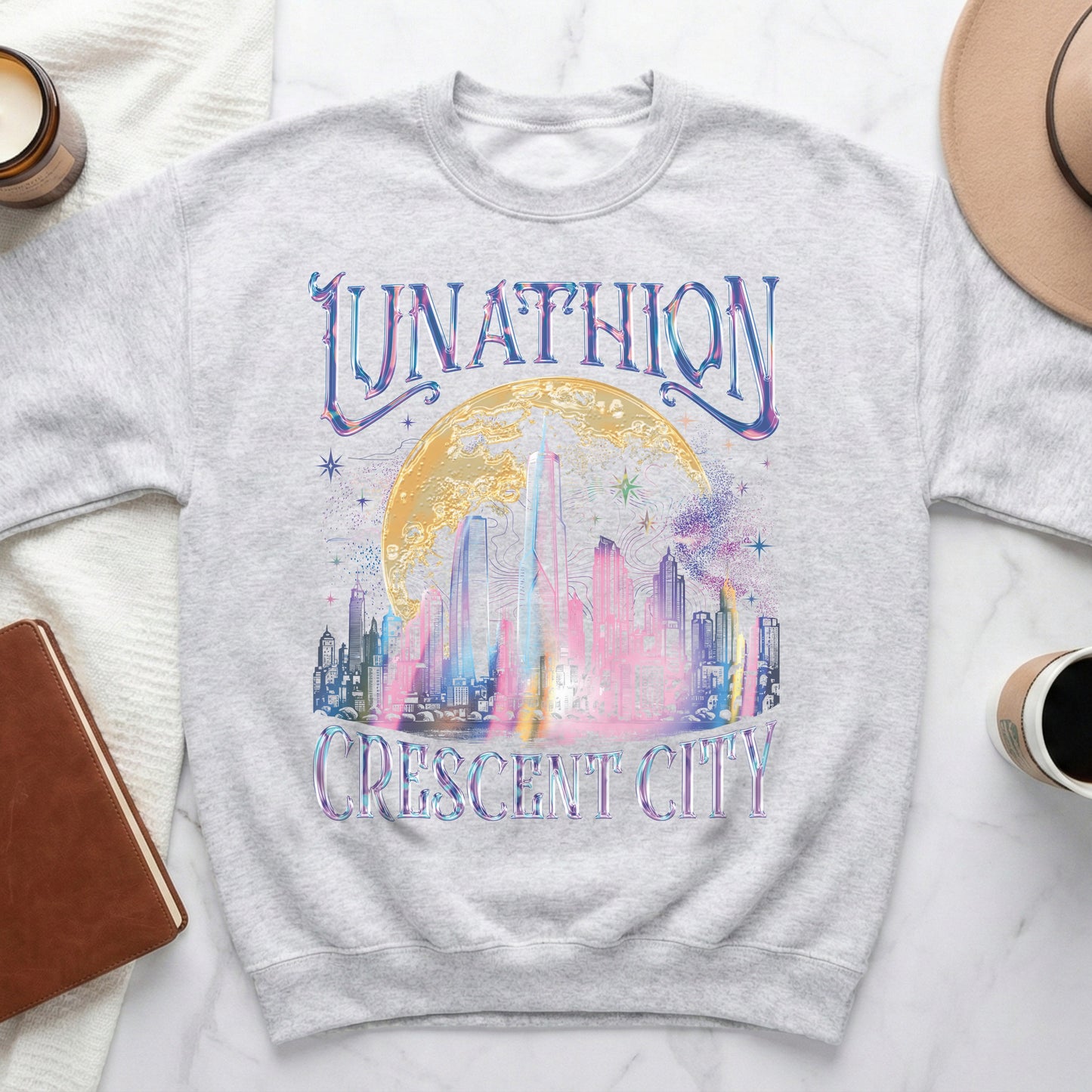 Light gray sweatshirt with "Lunathion Crescent City" text and a stylized cityscape.
