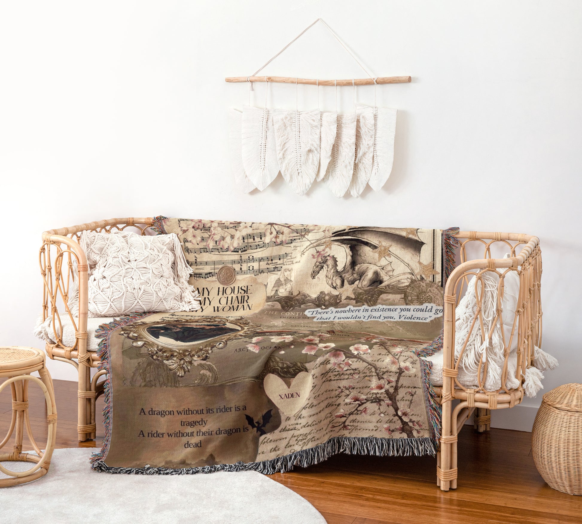 a cozy living room with a woven bench, a dragon-themed blanket, and a hanging feather decoration on the wall.