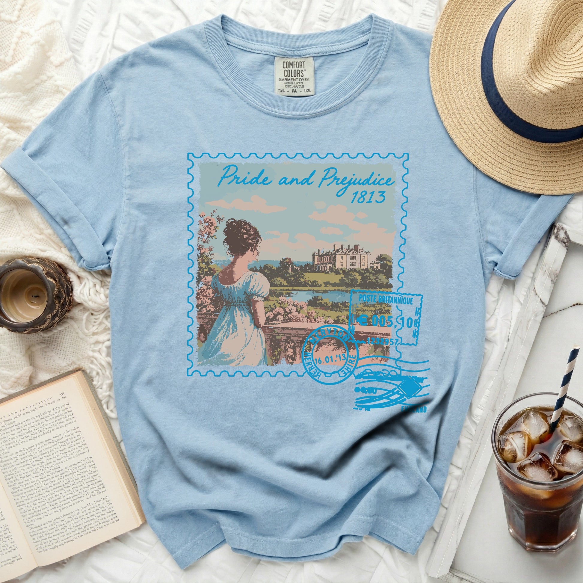 Light blue t-shirt with "Pride and Prejudice 1813" stamp graphic.