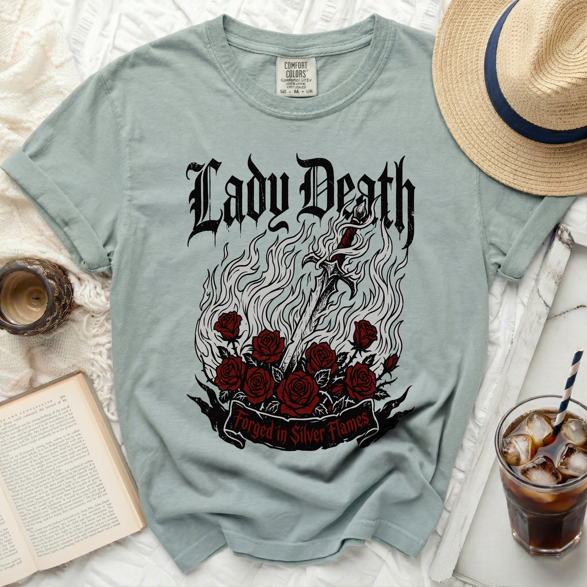 T-shirt with Lady Death graphic, sword, roses, and "Forged in Silver Flames".