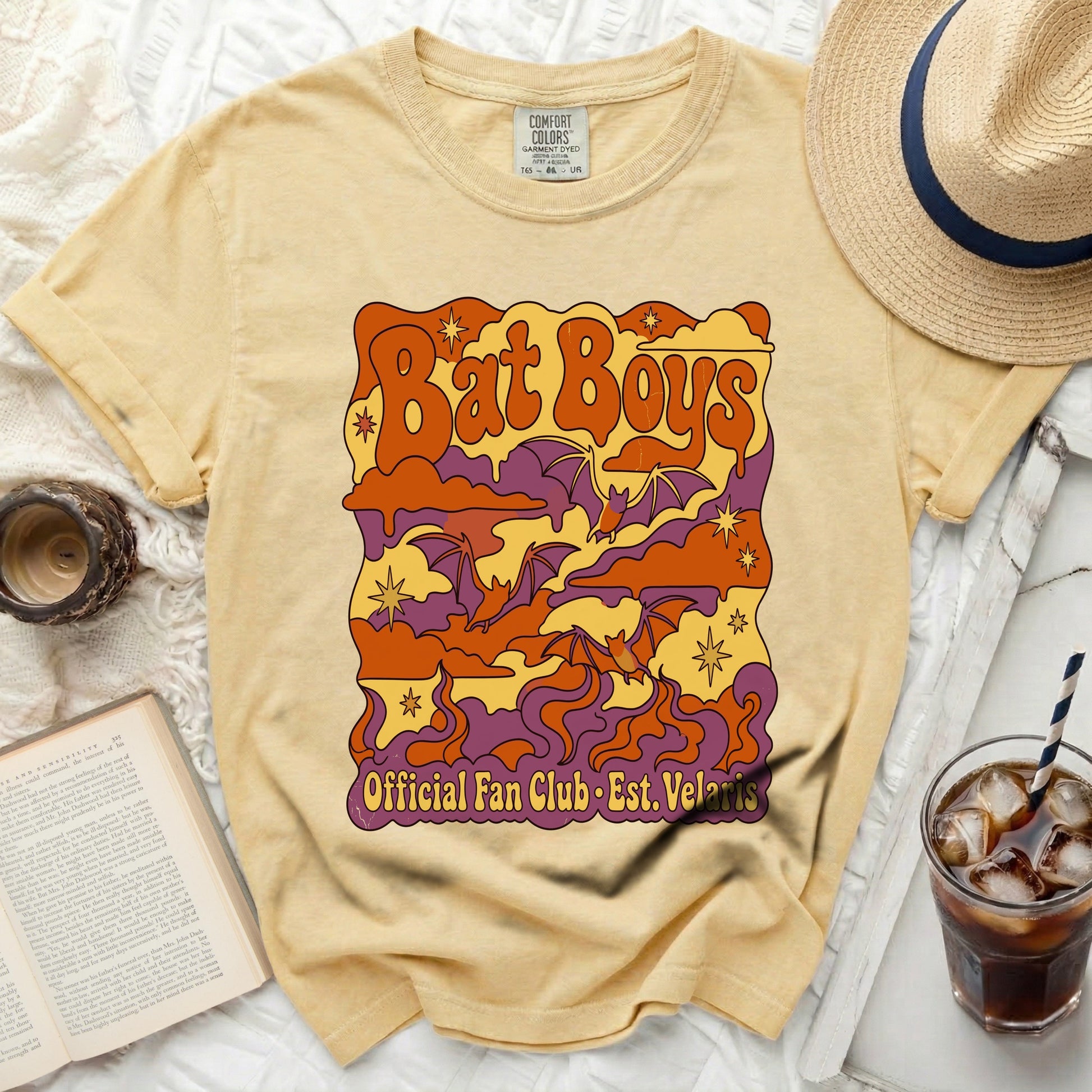 Yellow t-shirt with "Bat Boys Official Fan Club" graphic featuring bats.