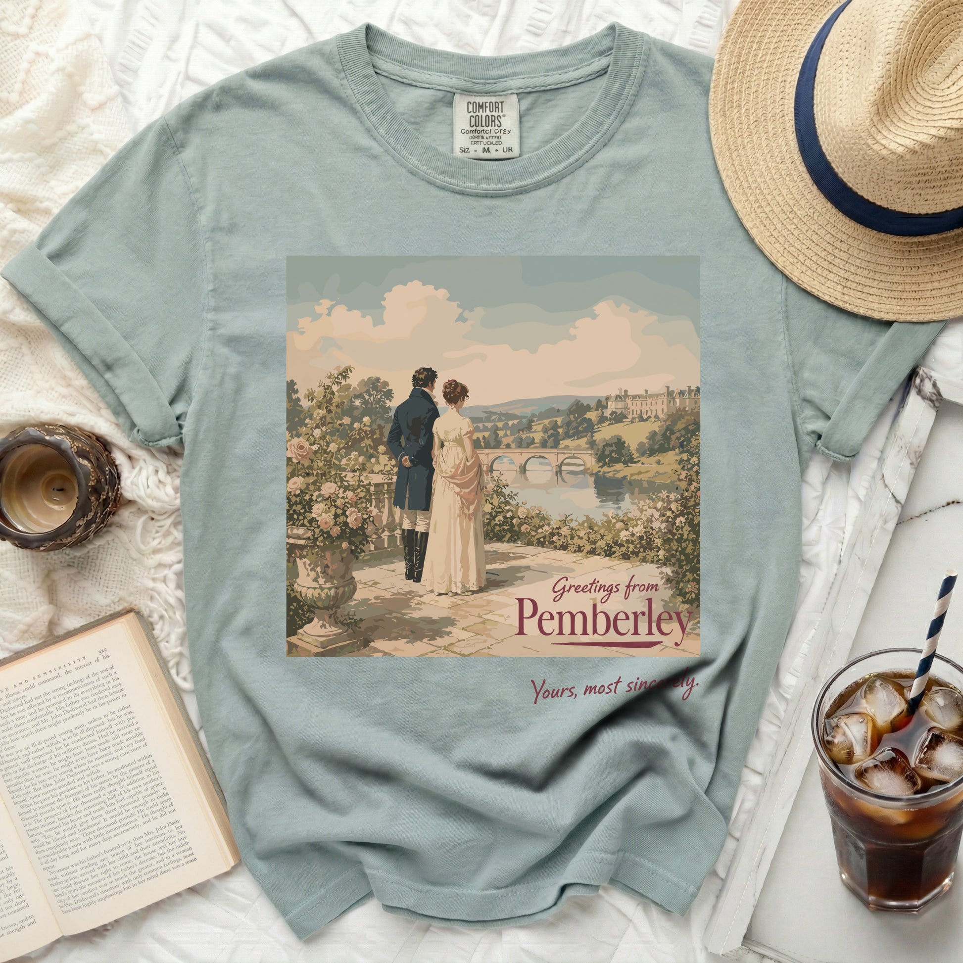 T-shirt with "Greetings from Pemberley" and couple overlooking landscape.
