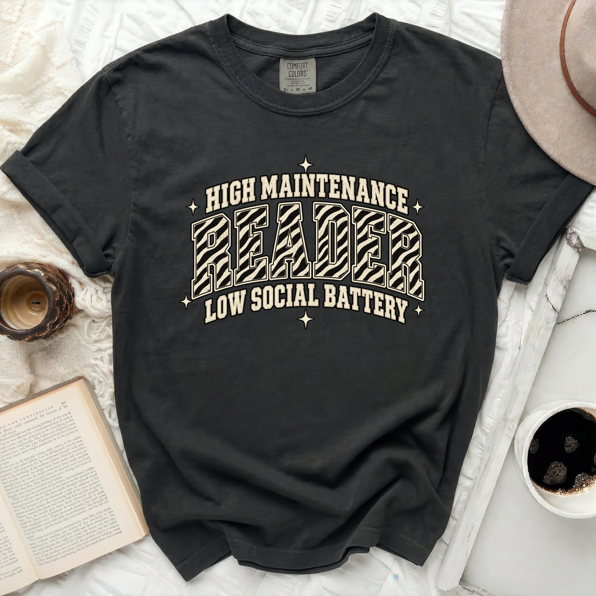Dark t-shirt with "High Maintenance Reader Low Social Battery" text.