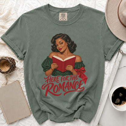 T-shirt with graphic of woman reading, text "Here for the Romance"