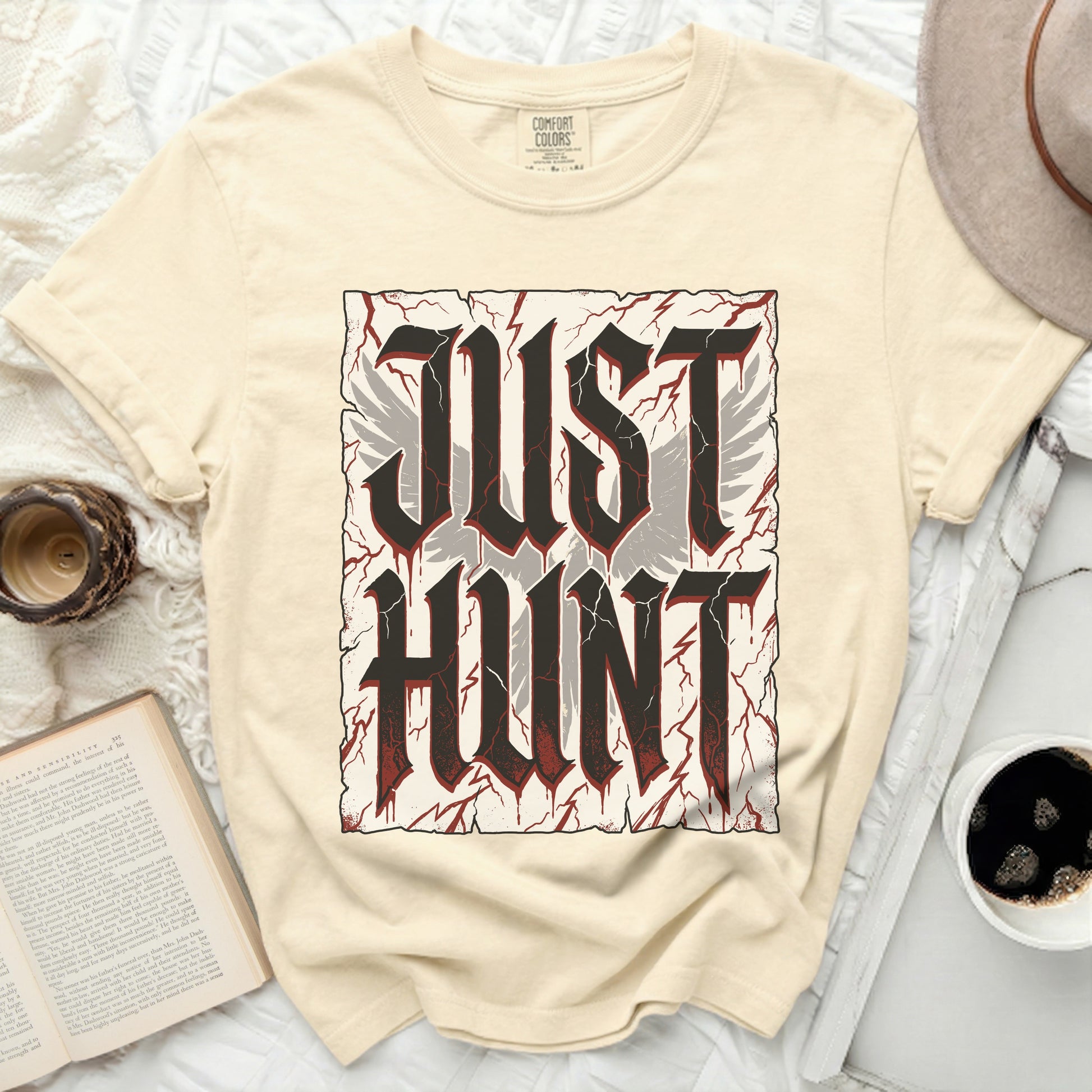 T-shirt with "JUST HUNT" text and distressed wings graphic.