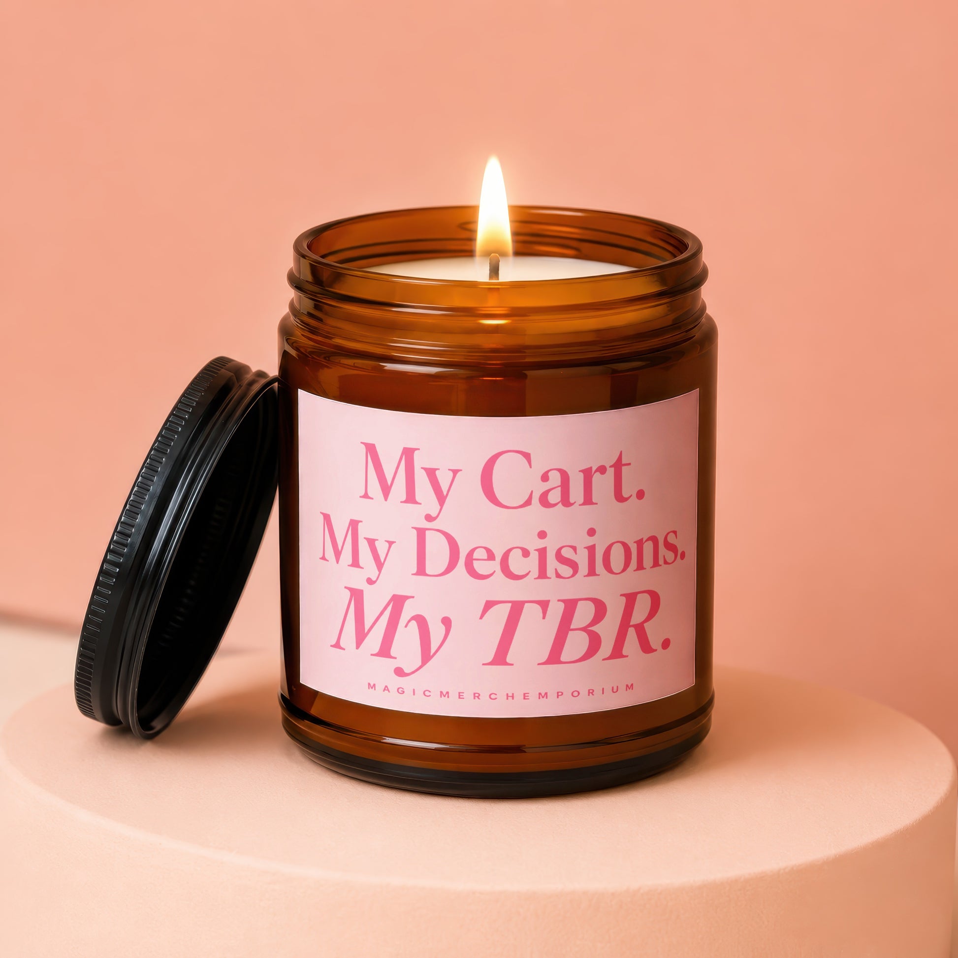 Amber jar candle with pink label reading "My Cart. My Decisions. My TBR."
