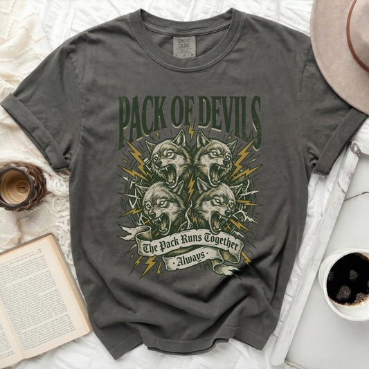 Dark grey t-shirt with "Pack of Devils The Pack Runs Together Always" graphic.