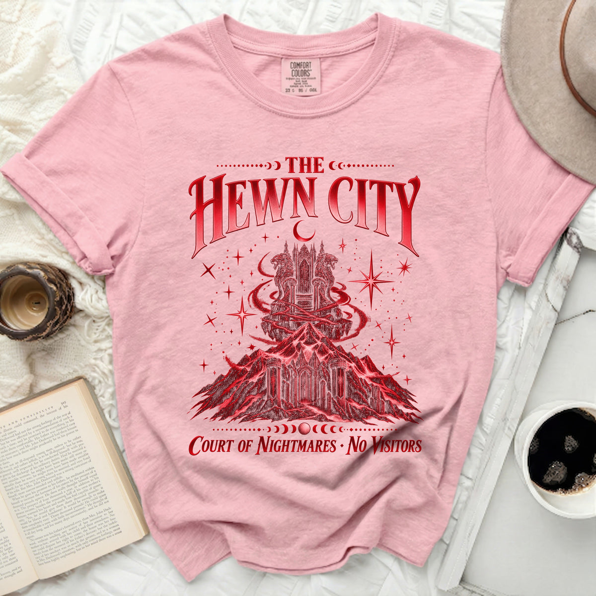 Pink t-shirt with "The Hewn City Court of Nightmares No Visitors" text.