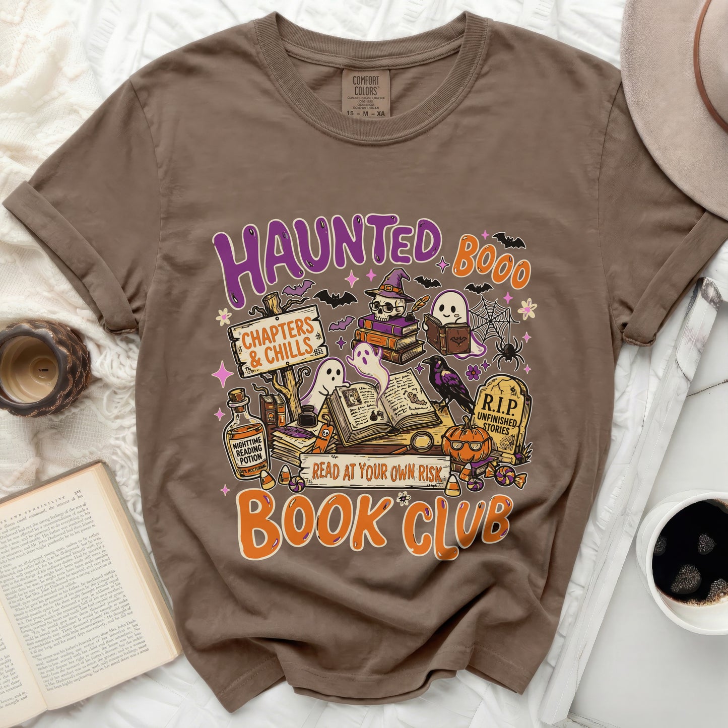 Brown t-shirt with "Haunted Book Club" Halloween graphic and spooky elements.