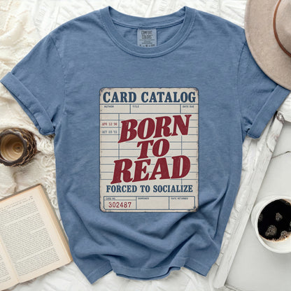 Blue t-shirt with "Card Catalog Born to Read Forced to Socialize" graphic.