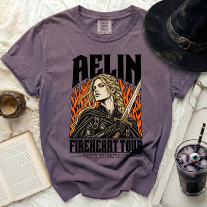 Purple t-shirt with "Aelin Fireheart Tour Queen of Terrasen" design and graphic.