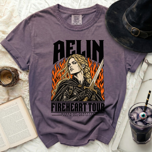 Purple t-shirt with "Aelin Fireheart Tour Queen of Terrasen" design and graphic.