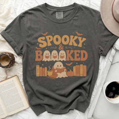 Spooky & Booked graphic tee with ghosts reading books.