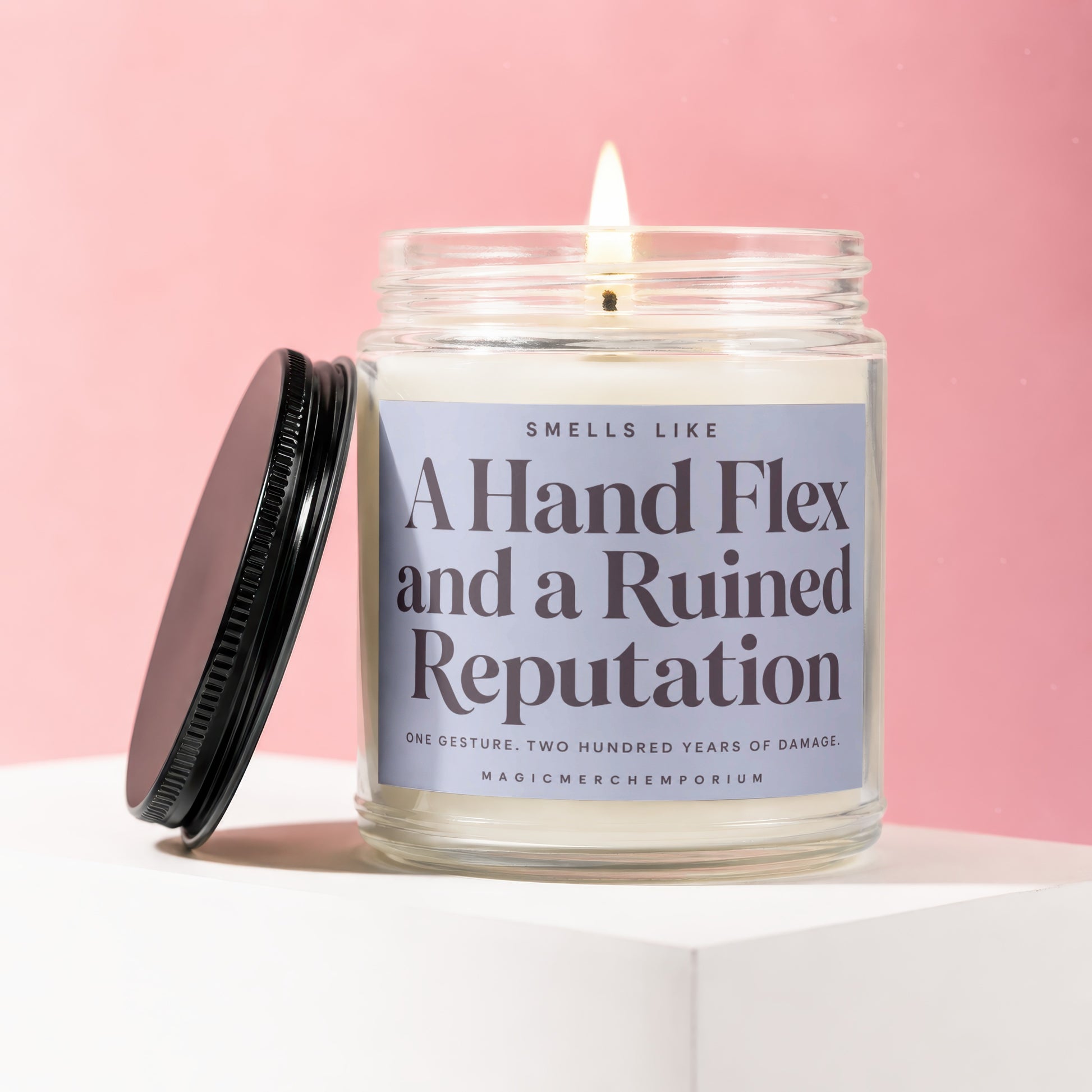 Scented candle with text "A Hand Flex and a Ruined Reputation".