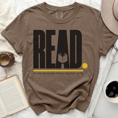 Brown t-shirt with "READ" and an open book graphic.