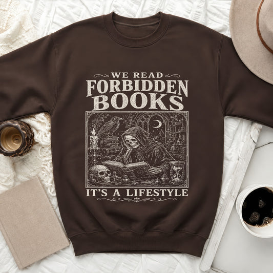 Brown sweatshirt with "We Read Forbidden Books, It's a Lifestyle" text and grim reaper reading.