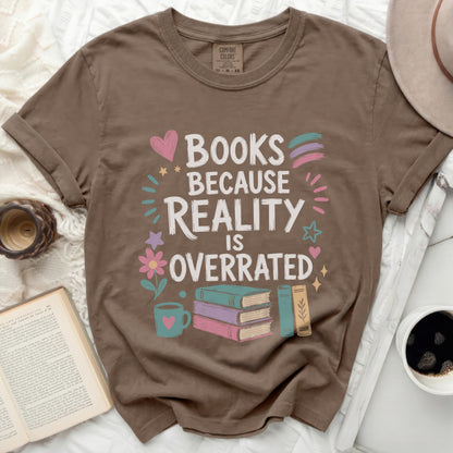 Brown t-shirt with "Books Because Reality Is Overrated" graphic and books.
