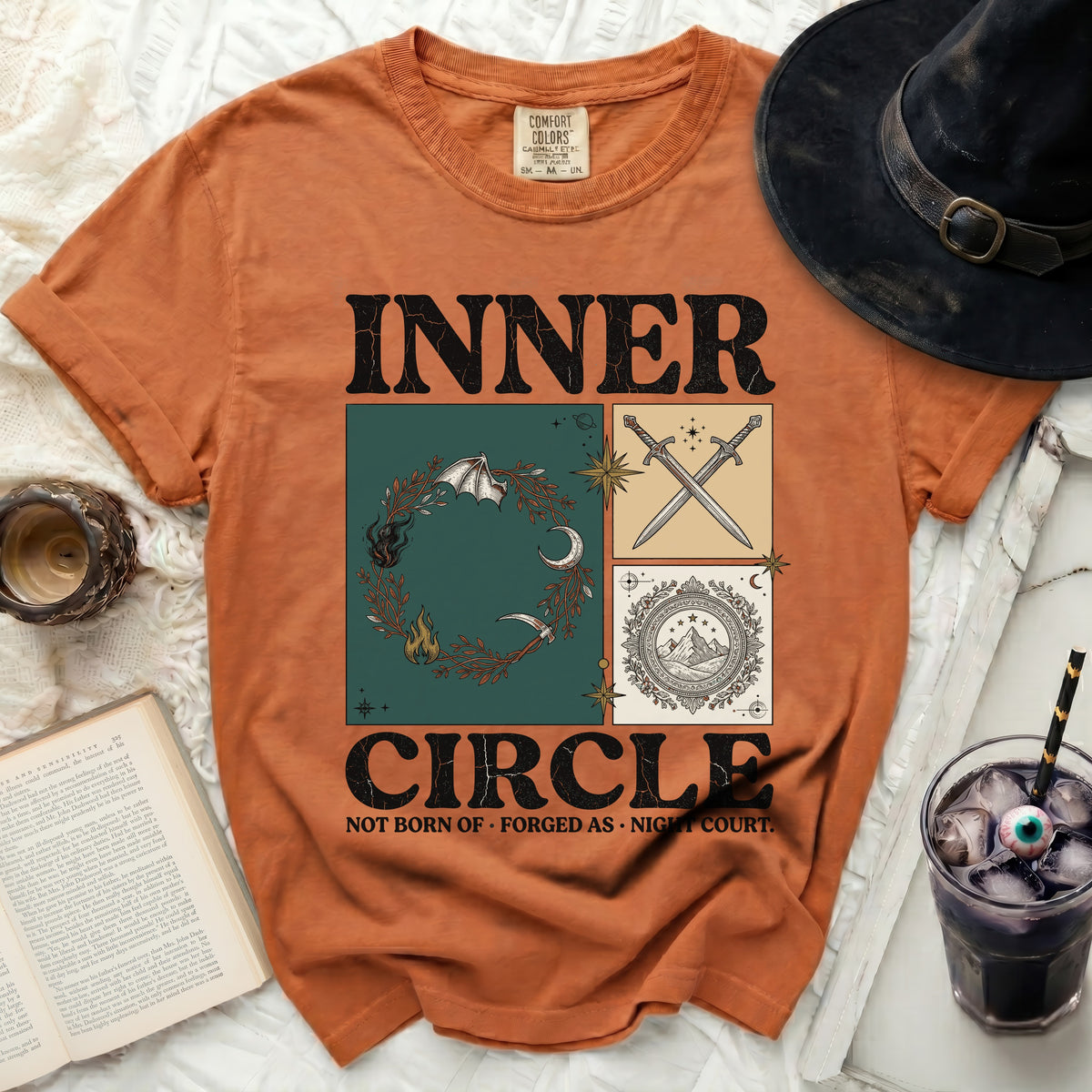 Orange Comfort Colors t-shirt with "INNER CIRCLE" and fantasy-themed graphics.