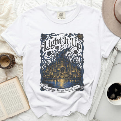 White t-shirt with "Light It Up Lunathion. For the Pack. Always." graphic.