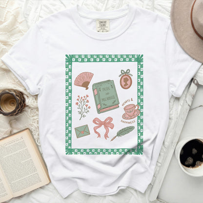 White Comfort Colors t-shirt with a green bordered graphic of "Pride and Prejudice" related illustrations.