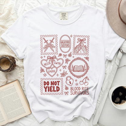 White t-shirt with red line art graphics including swords, mountains, books, and text.