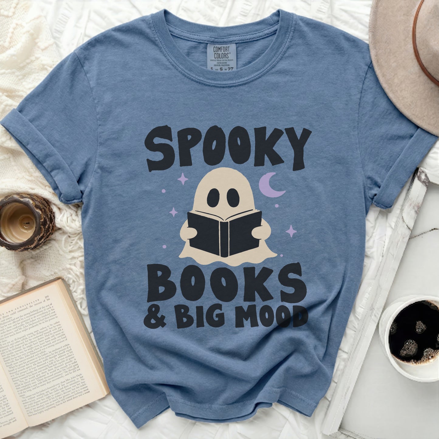 Blue t-shirt with "Spooky Books & Big Mood" text and a ghost reading.