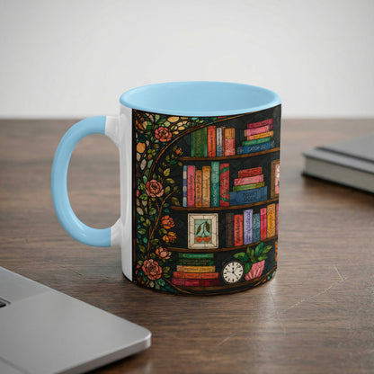Mug with light blue handle featuring a faux stained-glass bookshelf design.