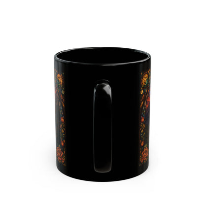 Black mug with colorful stained-glass style rose pattern on the side.