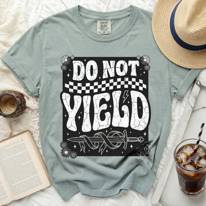 T-shirt with "DO NOT YIELD" and a sword graphic.