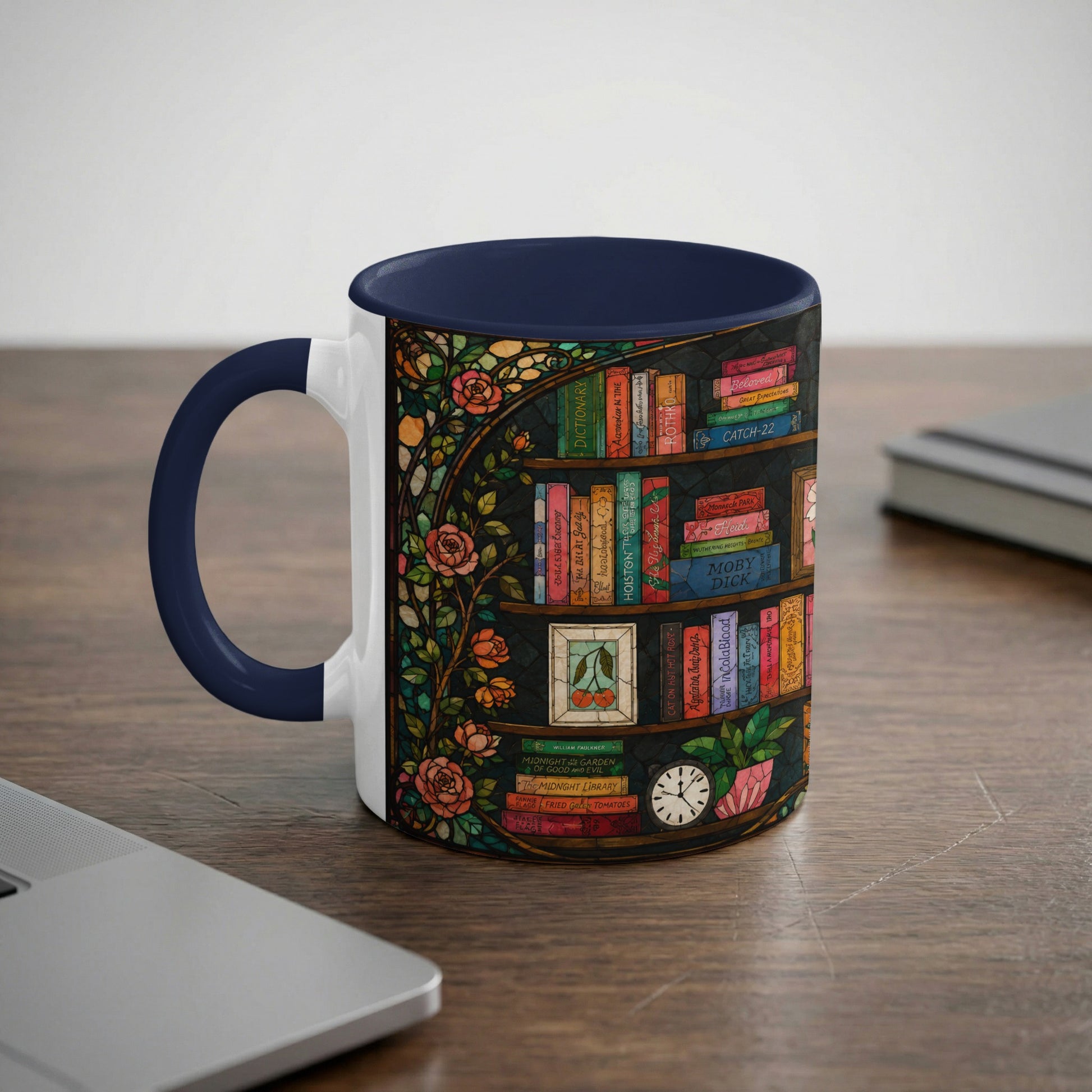 Mug with navy handle featuring a stained-glass effect bookshelf design and roses.