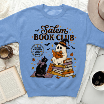 Salem Book Club ghost, black cat, and witchy reads graphic on blue sweatshirt.