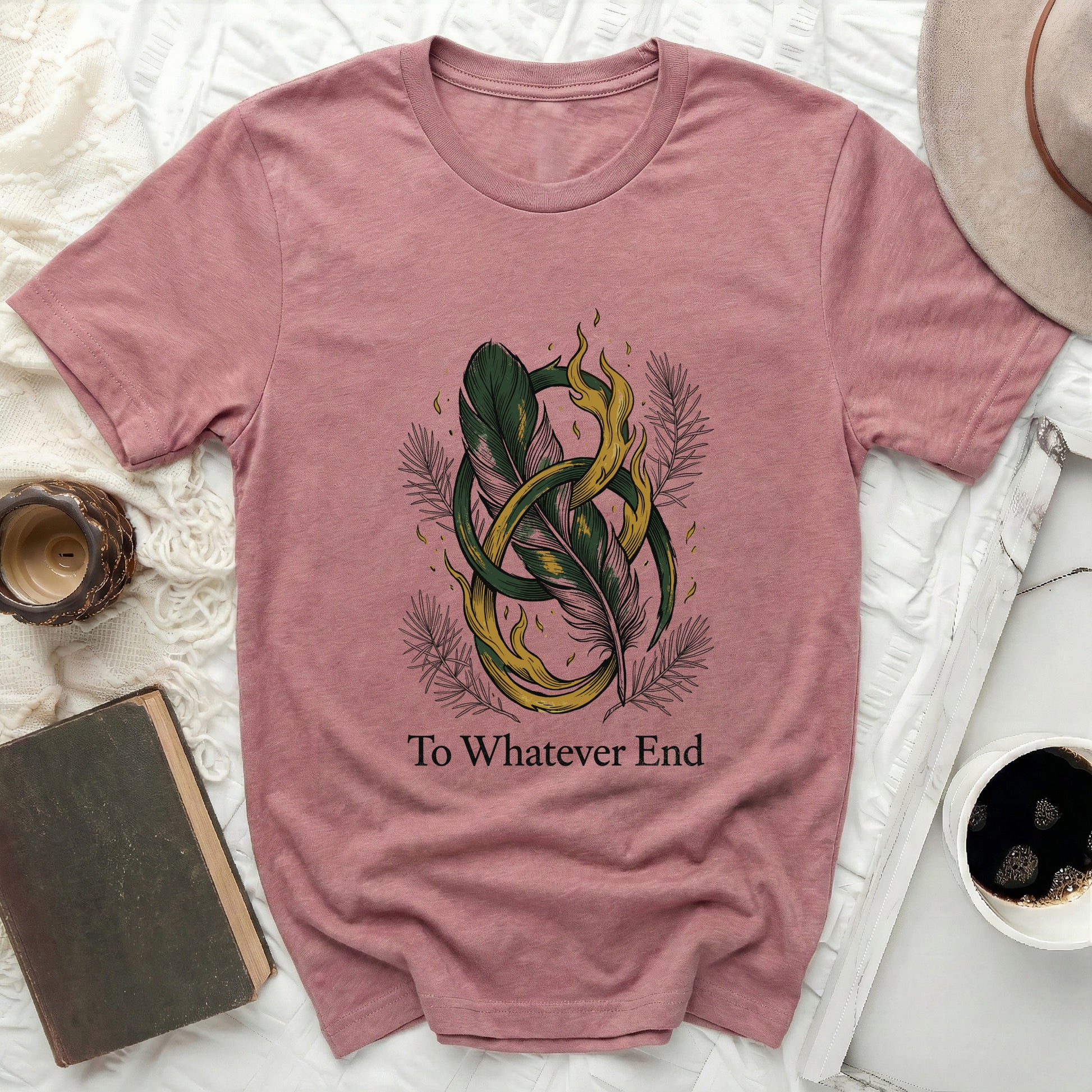 Pink t-shirt with intertwined feathers and flames design, text "To Whatever End".