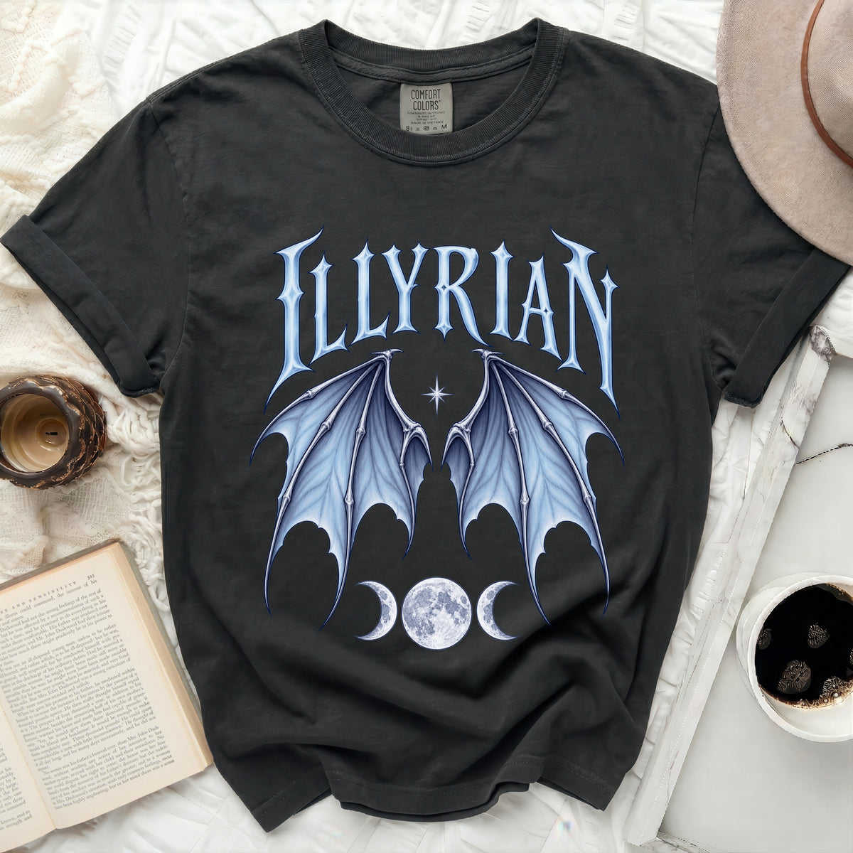 Dark t-shirt with "ILLYRIAN" text, bat wings, and moon phases graphic.