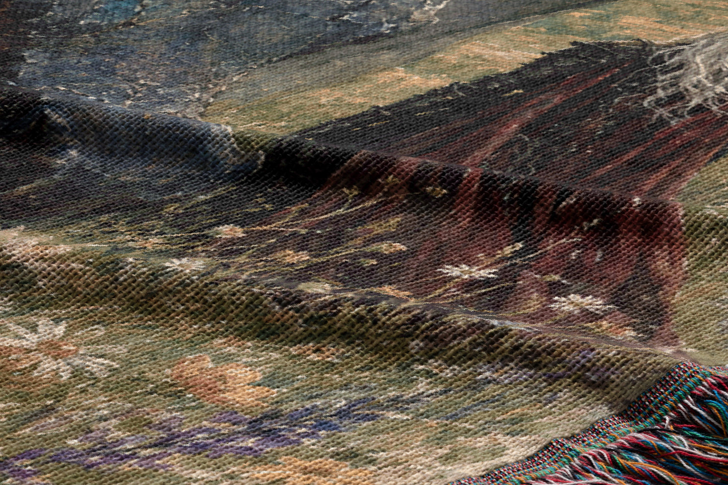The image is a close-up of a textured fabric with a floral pattern, featuring a mix of green, brown, and white colors.
